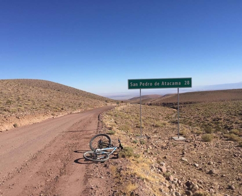 bike lying in the desert