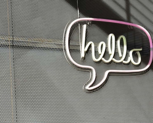 hello sign - good at speaking English
