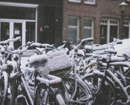 snowy bikes - winter in Amsterdam