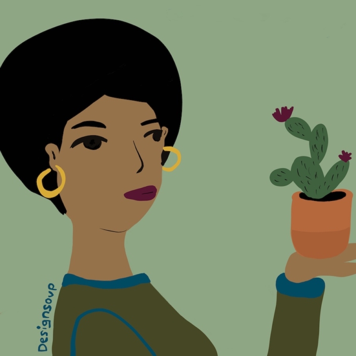 Woman holding cactus